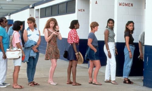 Women waiting in bathroom line