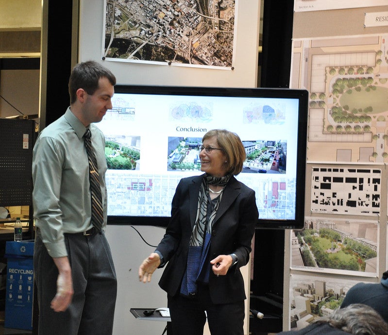 Mady with Mark Elliot M.Arch '13 during his thesis presentation