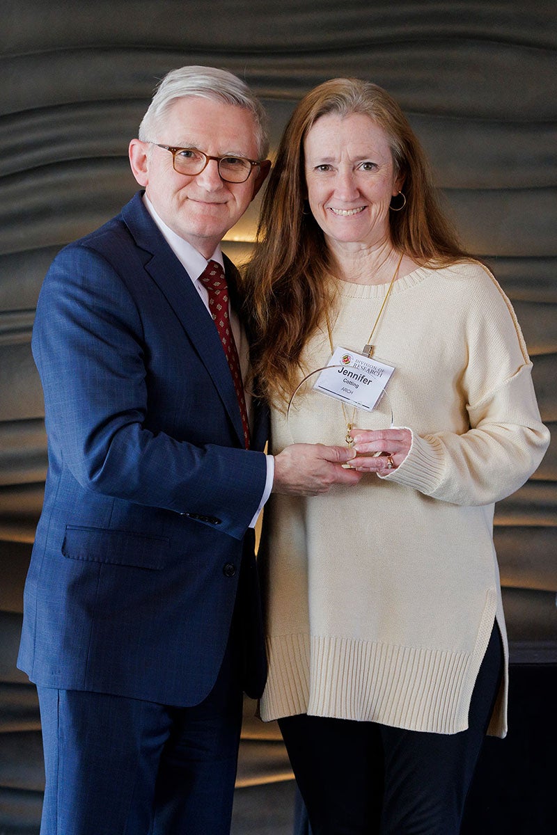Jennifer Cotting receiving the award