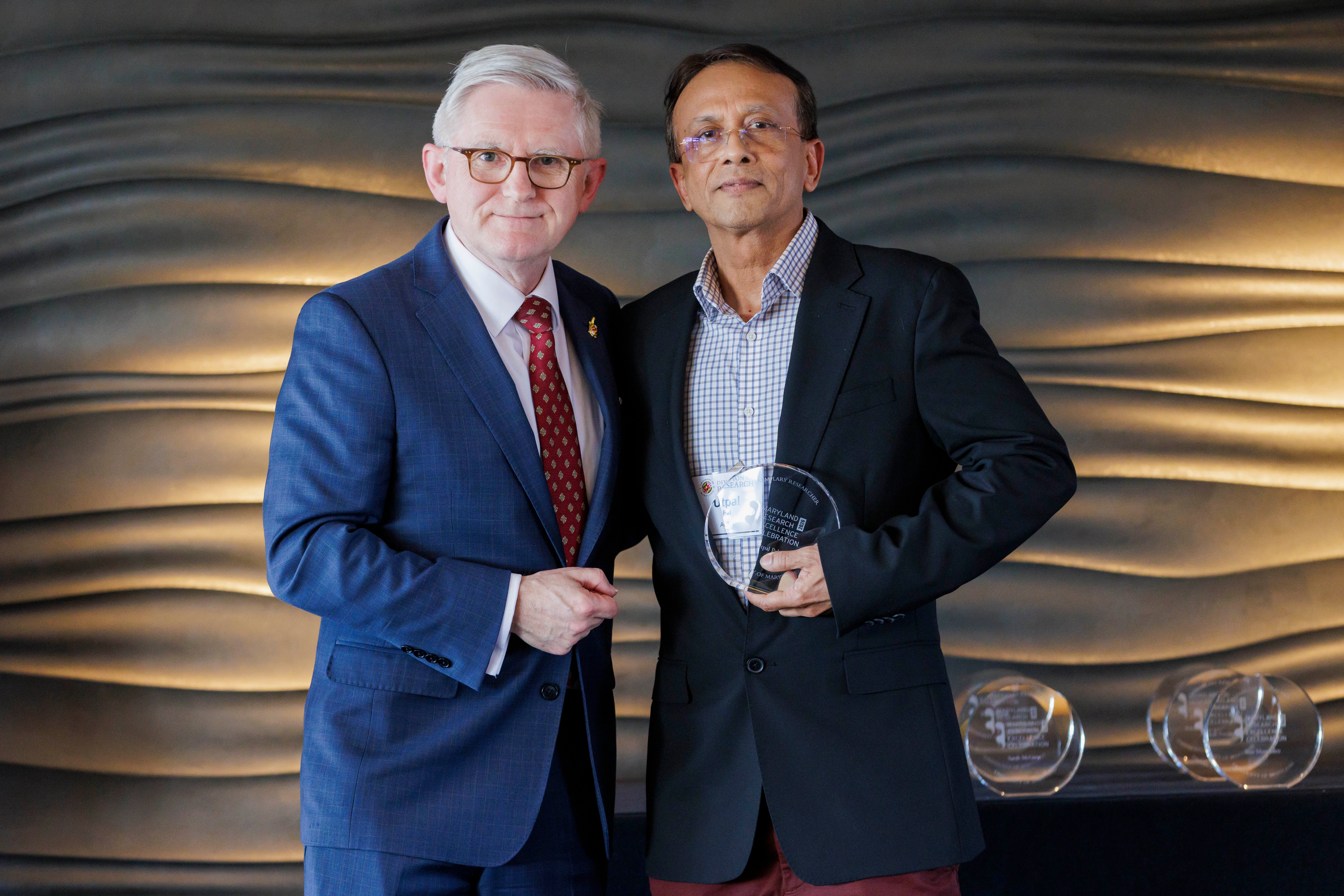 Utpal Pal receiving award