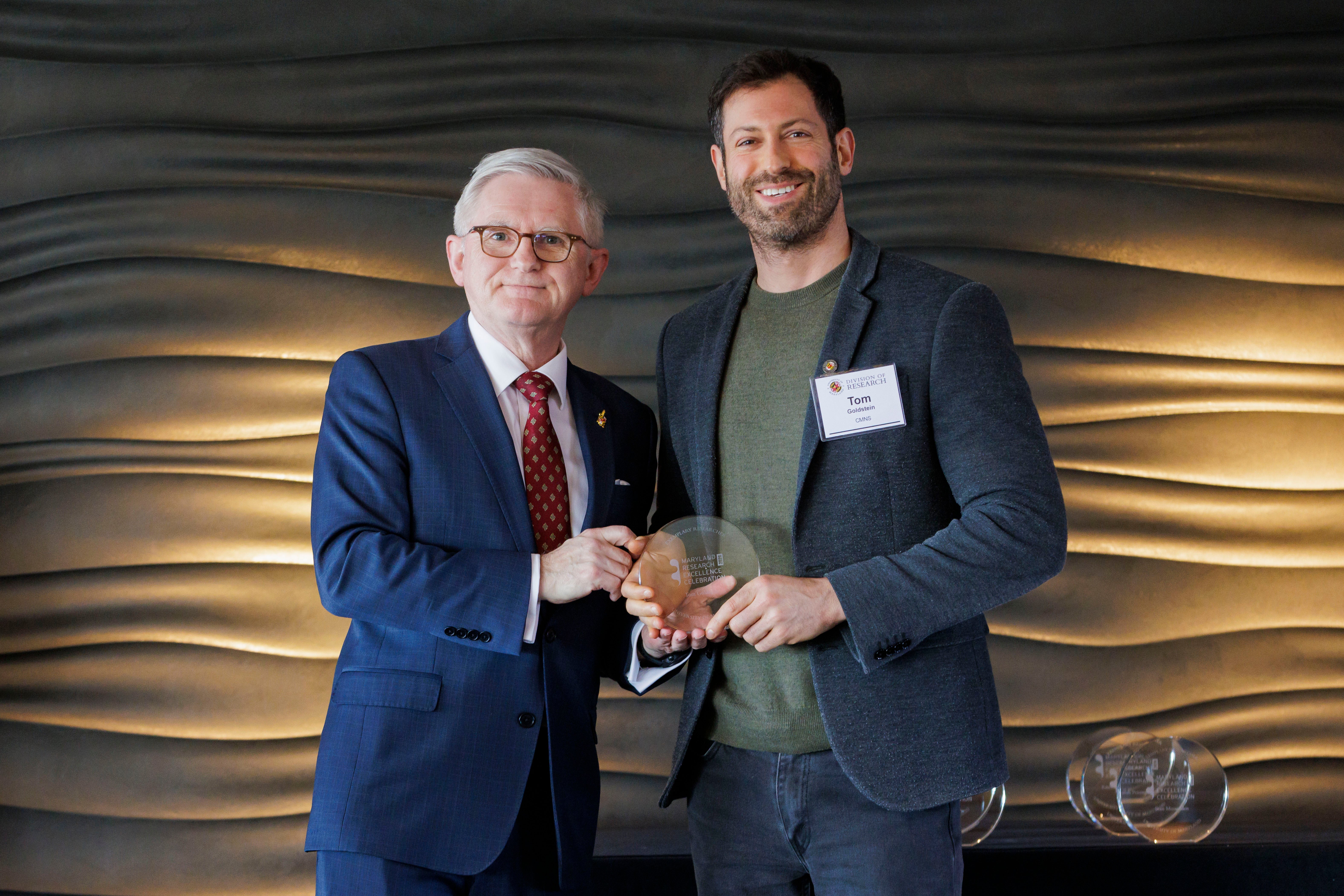 Tom Goldstein receiving award