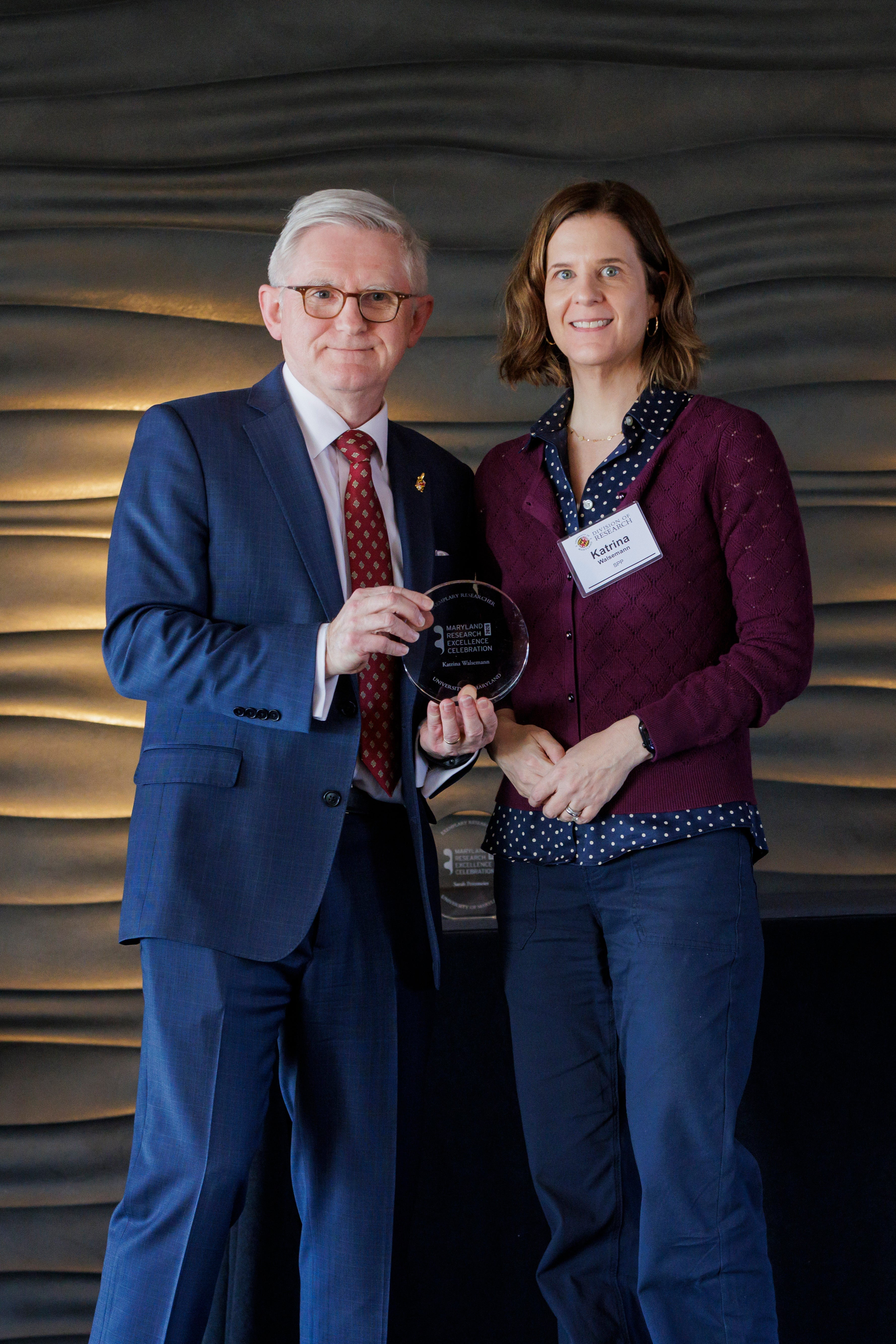 Katrina Walsemann receiving award