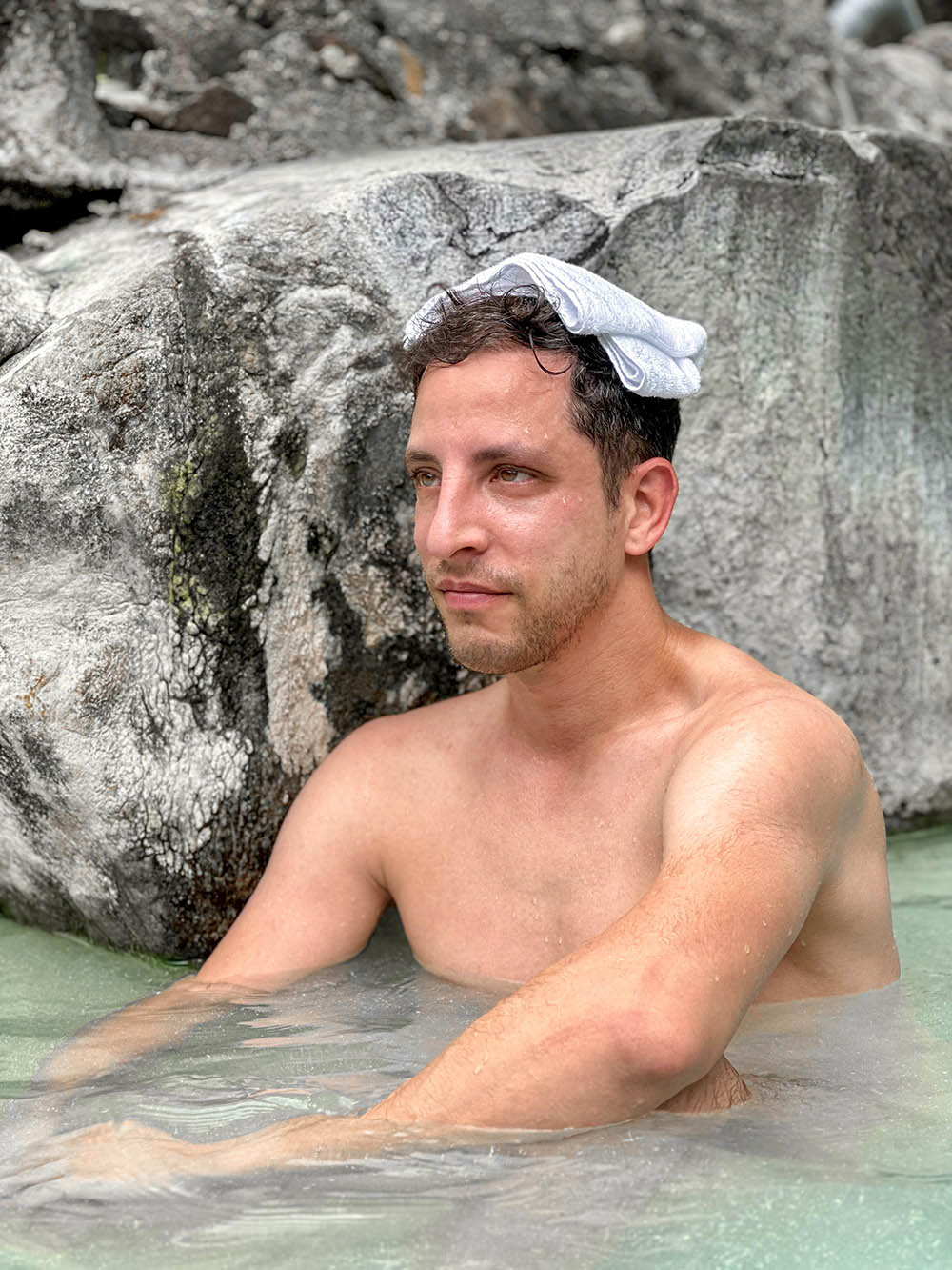 Yuval Zohar in a Japanese spa with a towel on his head.
