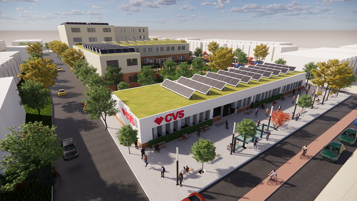 A green roof with solar panels on top of a CVS.