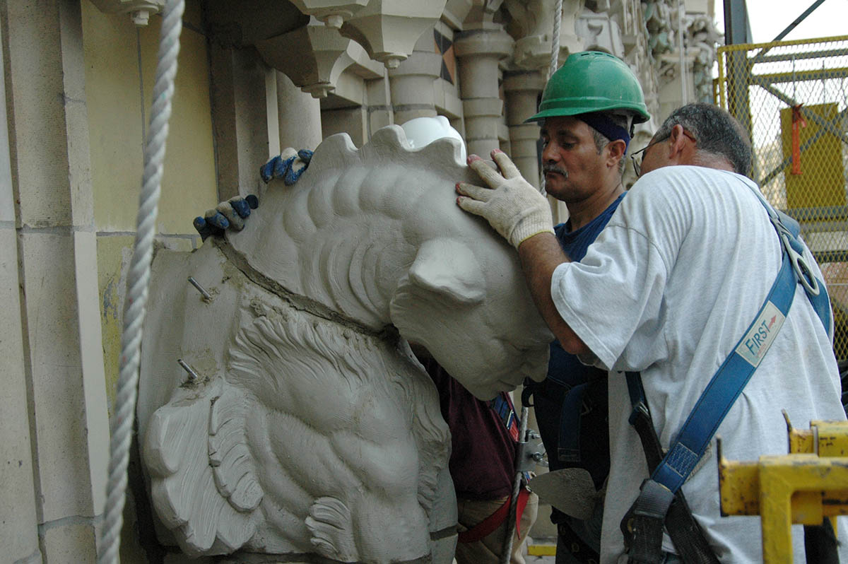 A new gargoyle is installed at 90 West in lower Manhattan. Of the 100 additions, a handful bared the likeness of family and friends, including Doug Gardner, who was lost on 9/11.
