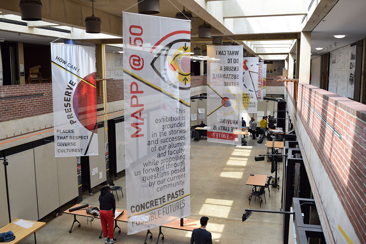 MAPP@50 colorful banners hanging from the Great Space in the Architecture Building