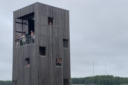 Dark grey, tall and rectangular Scandinavian building