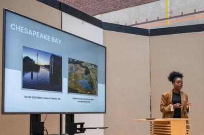 A student presenting her ArchiNova project on modular vegetation at the Chesapeake Bay