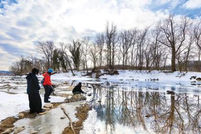 Researchers on the Potomac River gathering water samples
