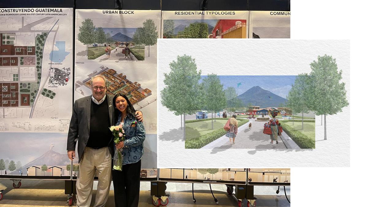 Student posing with teacher in front of architectural renderings