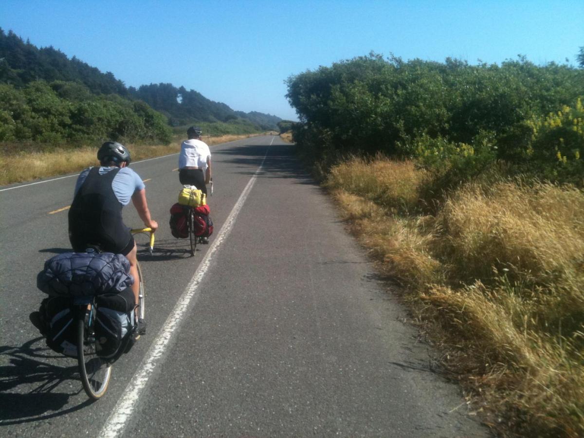 Two bikers on a road