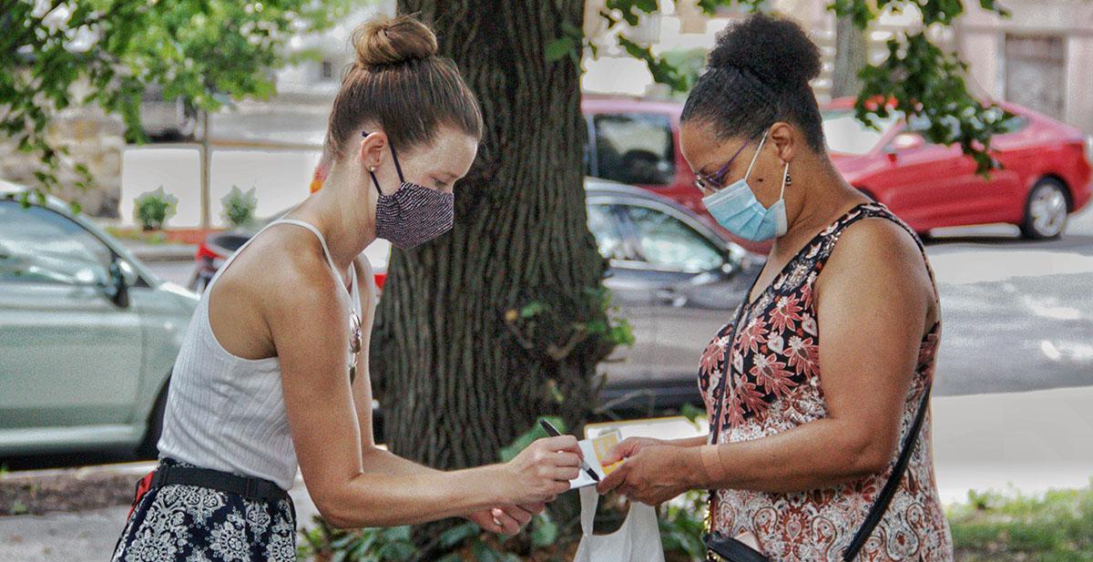 Amber conducting a community survey