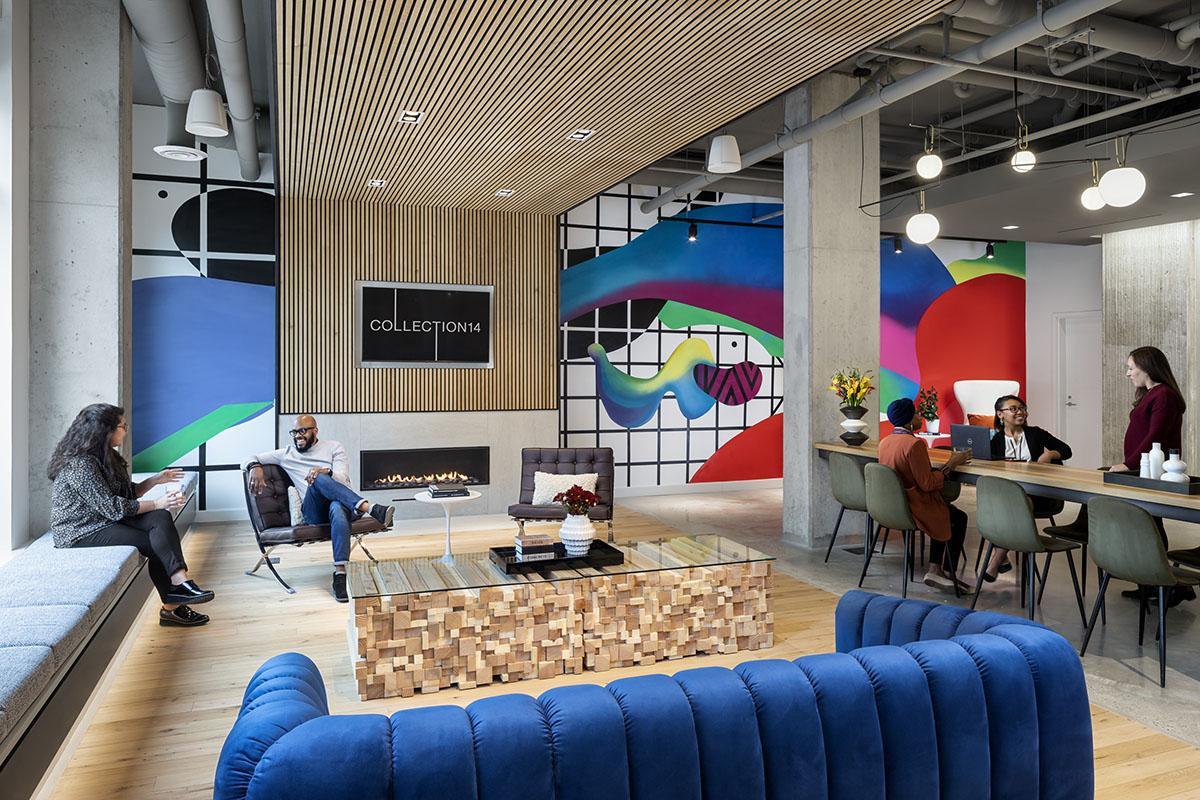 Interior of Collection 14's building with colorful couches and murals