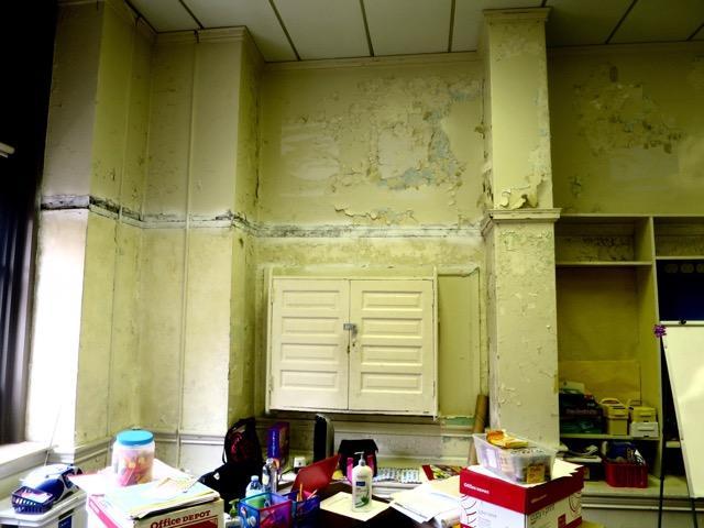 A run down interior of a classroom