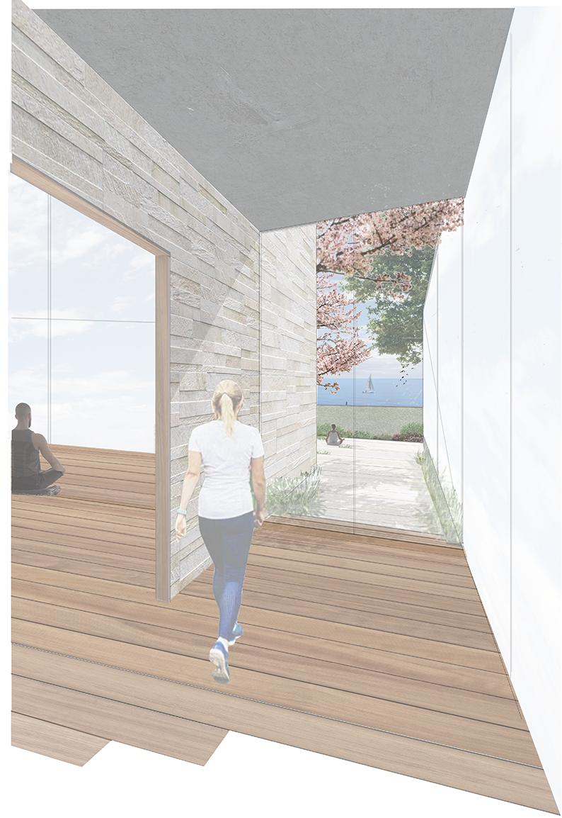 A woman walking in a building towards the exterior