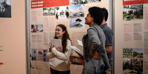 Students at Social Housing exhibit
