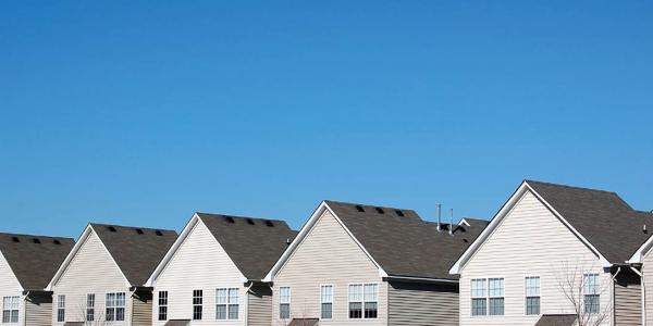 Row of houses and clear blue sky