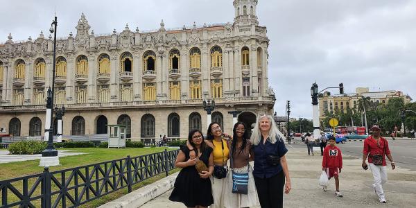 Students and faculty in front of a building in Havana, Cuba