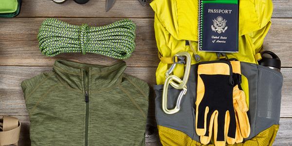 Hiking apparel and clothing including rope, gloves, clothes, backpack and a U.S. passport