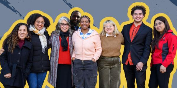 Group photo of the UEC Community Fellows with an illustrated yellow and blue background.