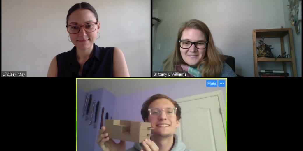 Screenshot of ARCH virtual class where student holds up a model.