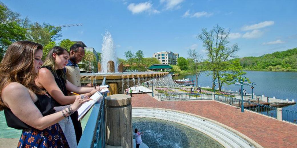 Students Sketch Near a Fountain