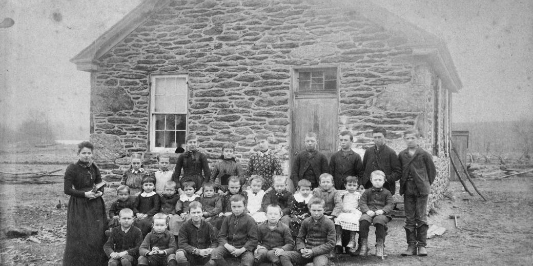 Historic B&W photo ca. 1890 of the original Hyson School. A class photo was taken each year. Courtesy of Don Linebaugh.