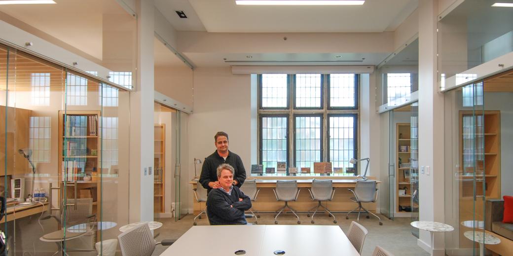 Two men standing in an architecture studio