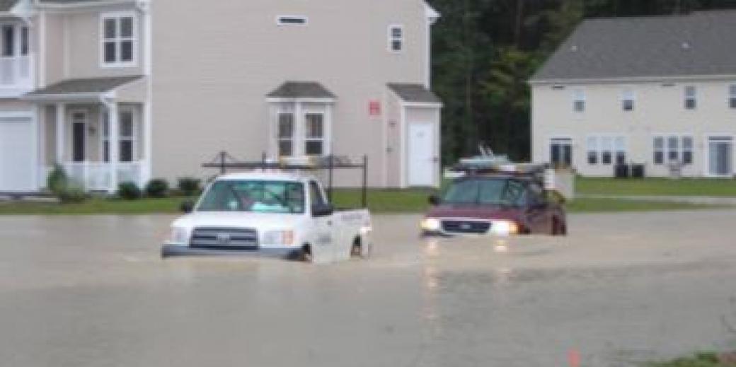 flooded street with cars