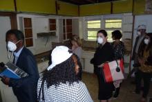 Students tour the interior, which was gutted prior to the acquisition.