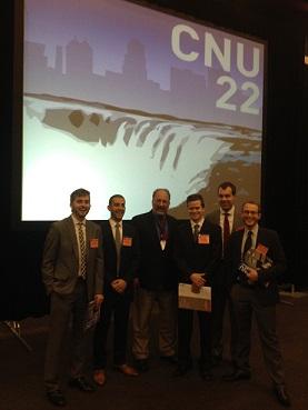 Team members celebrate after accepting the grand prize at the CNU Congress in Buffalo, NY.