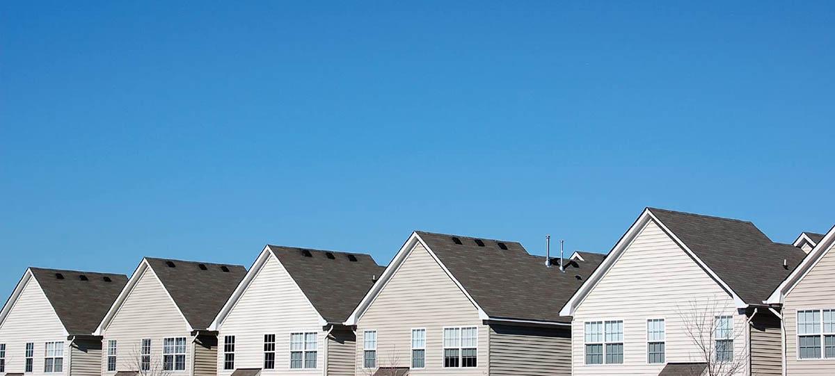 Row of houses and clear blue sky