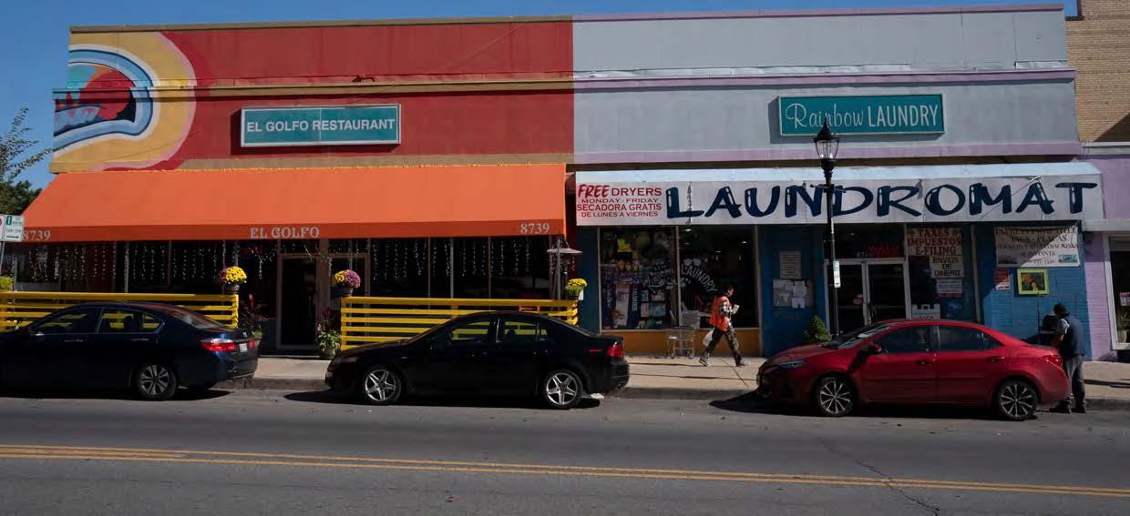 A street-side restaurant and laundromat 
