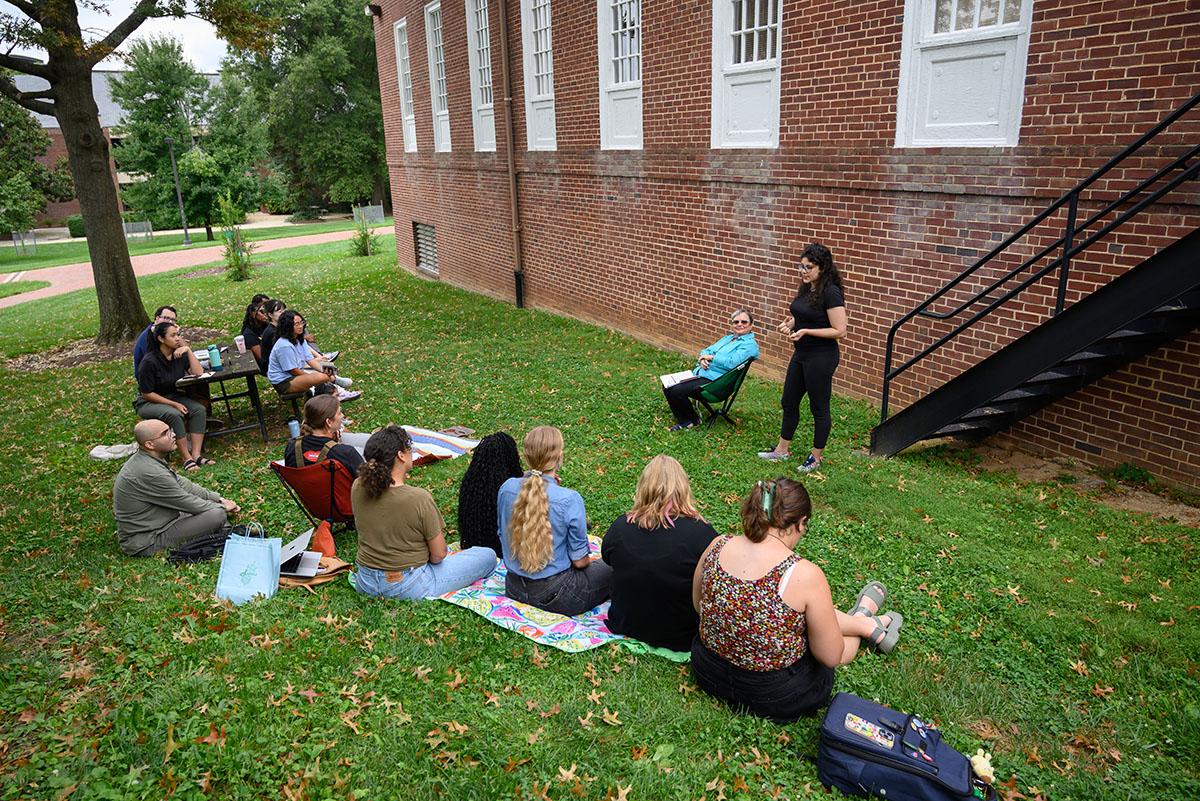 Students sitting outdoors for their courses