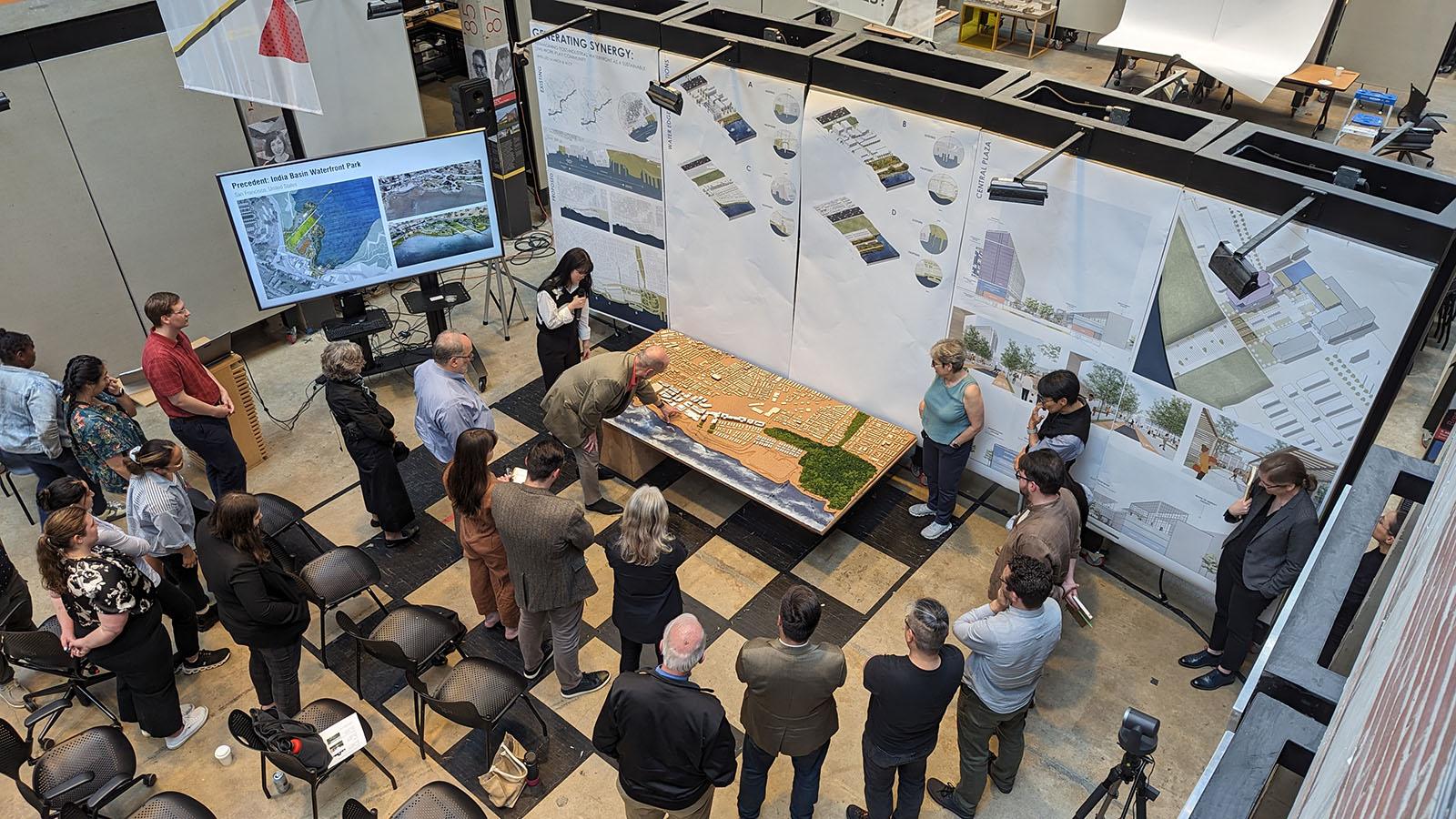 A large model of the Philadelphia waterfront displayed during an architecture thesis review