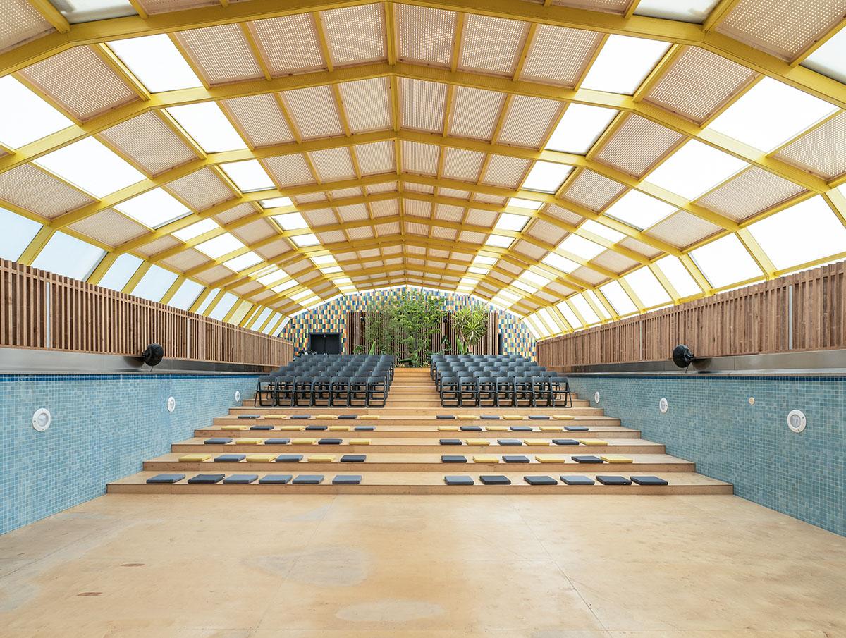 Auditorium seating inside a vacant pool