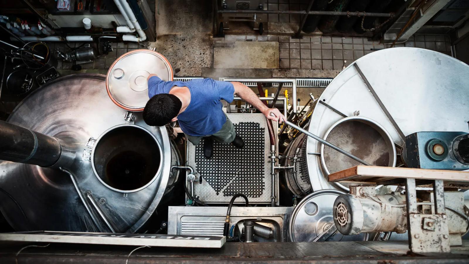 Birds eye view of man working in a brewery
