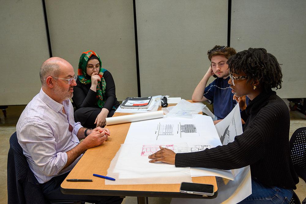Alumni critiquing architecture student work