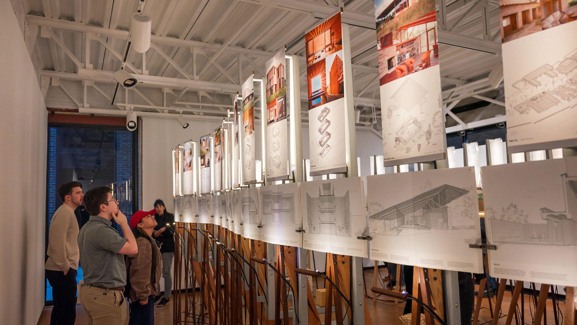 People looking at the biogenic solutions Kibel gallery exhibit installation