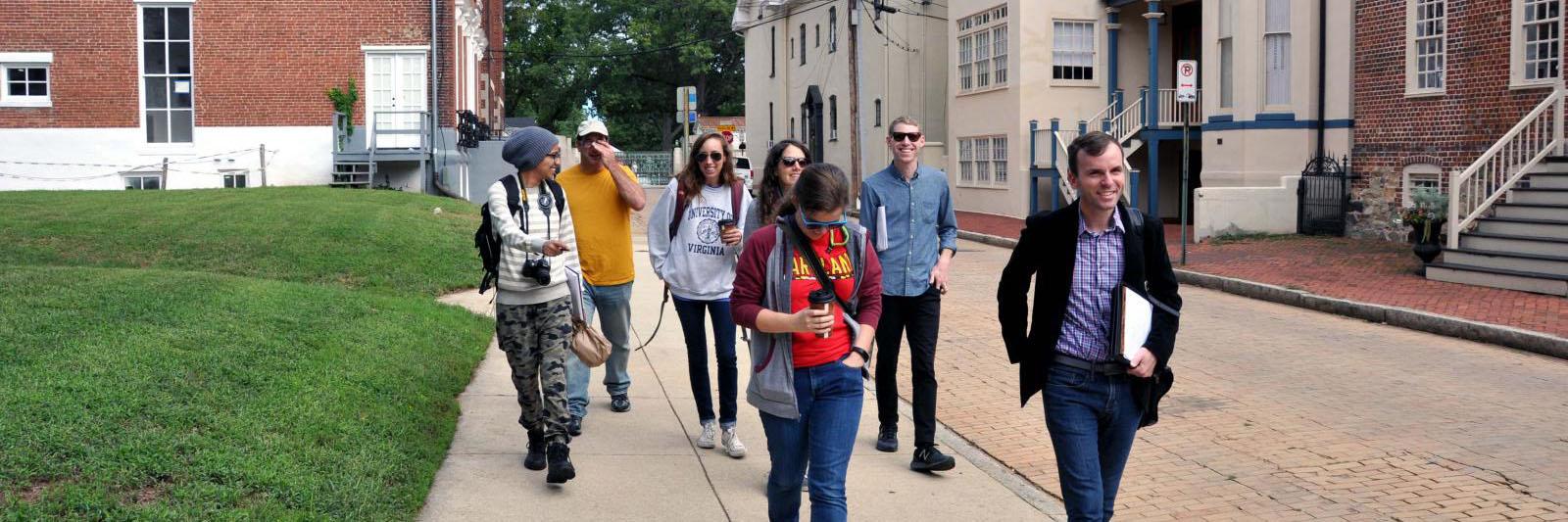 Students walking in a historic neighborhood
