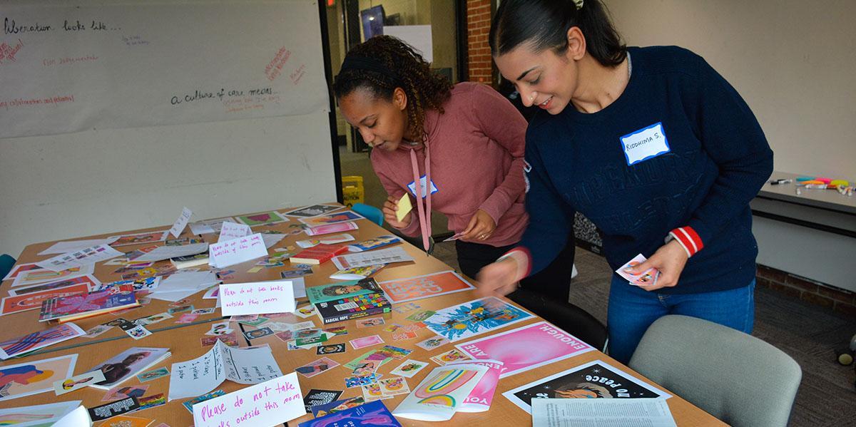 Two students working on a craft together
