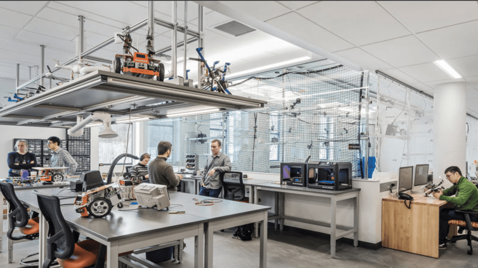 People working in a educational, maker space lab