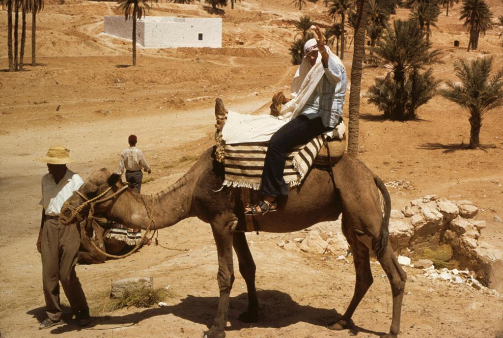Roger Lewis on a camel
