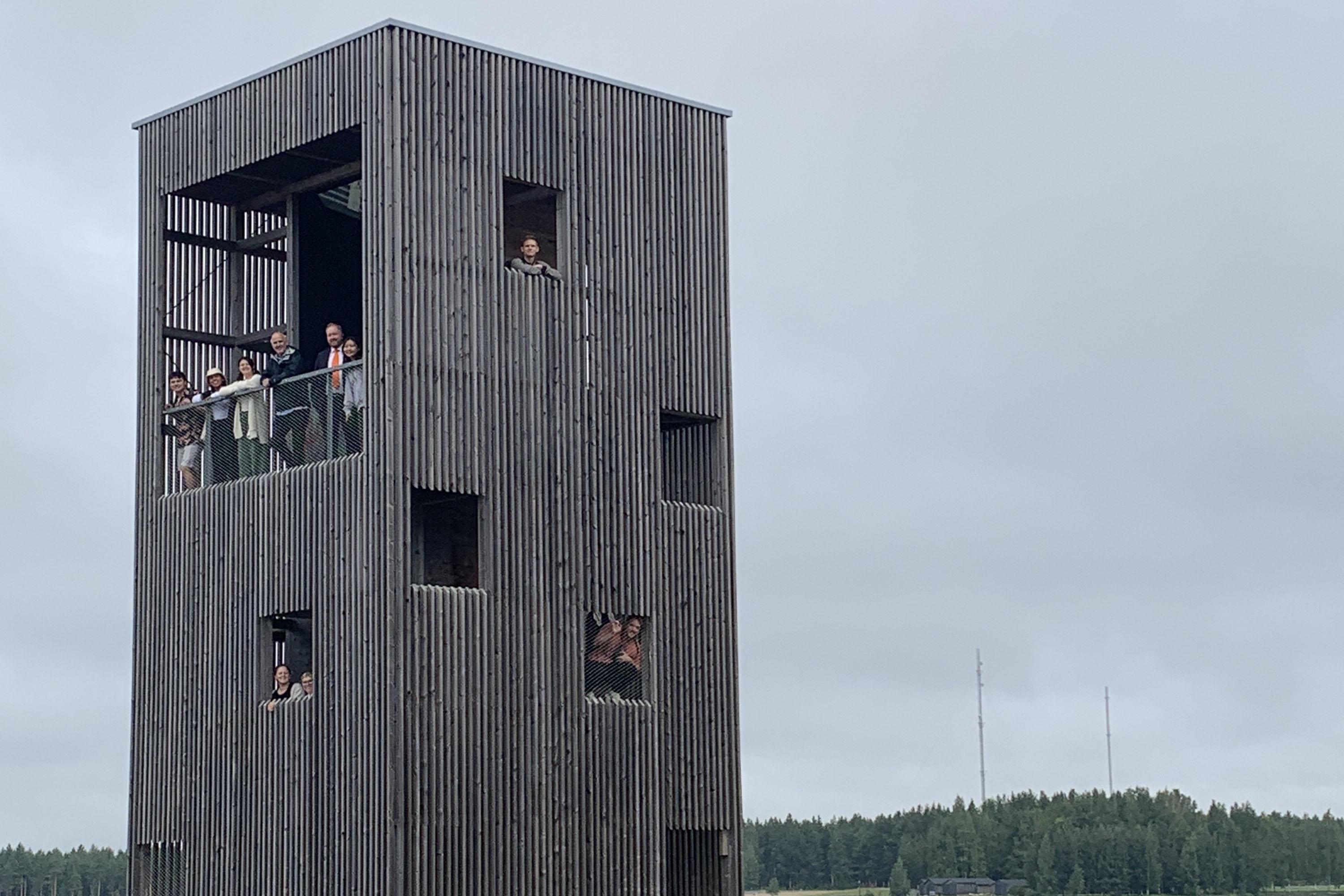 Dark grey, tall and rectangular Scandinavian building