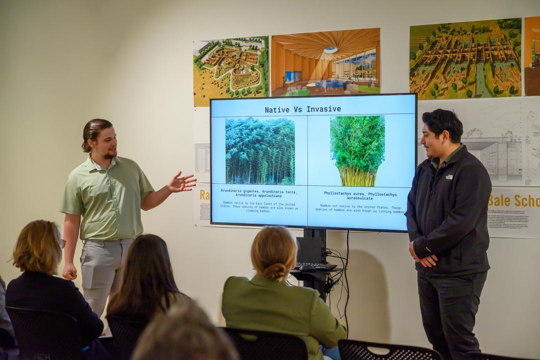 Students presenting their architecture project on sustainably harvesting and repurposing bamboo.