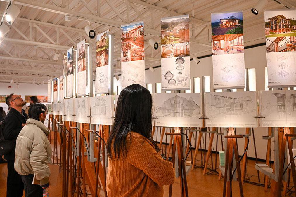 People looking at the biogenic solutions Kibel gallery exhibit installation