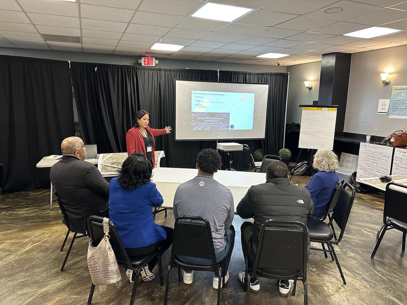 Cathy Morrison '04 presenting the U.S. Department of Transportation's Reconnecting Communities Pilot Grant Program.