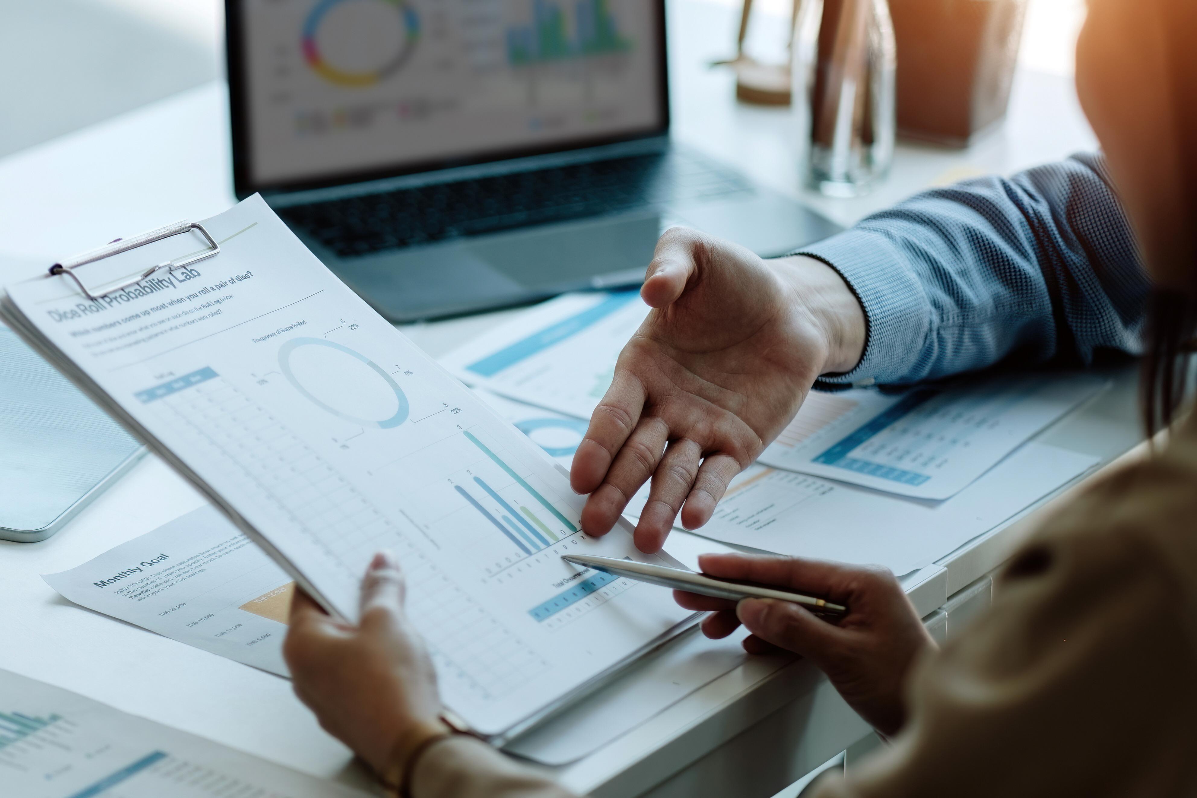 Business People Analyzing Statistics Business Documents, Financial Concept