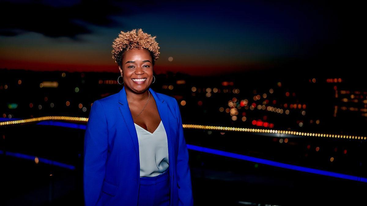 Heather Wellington in a blue suit