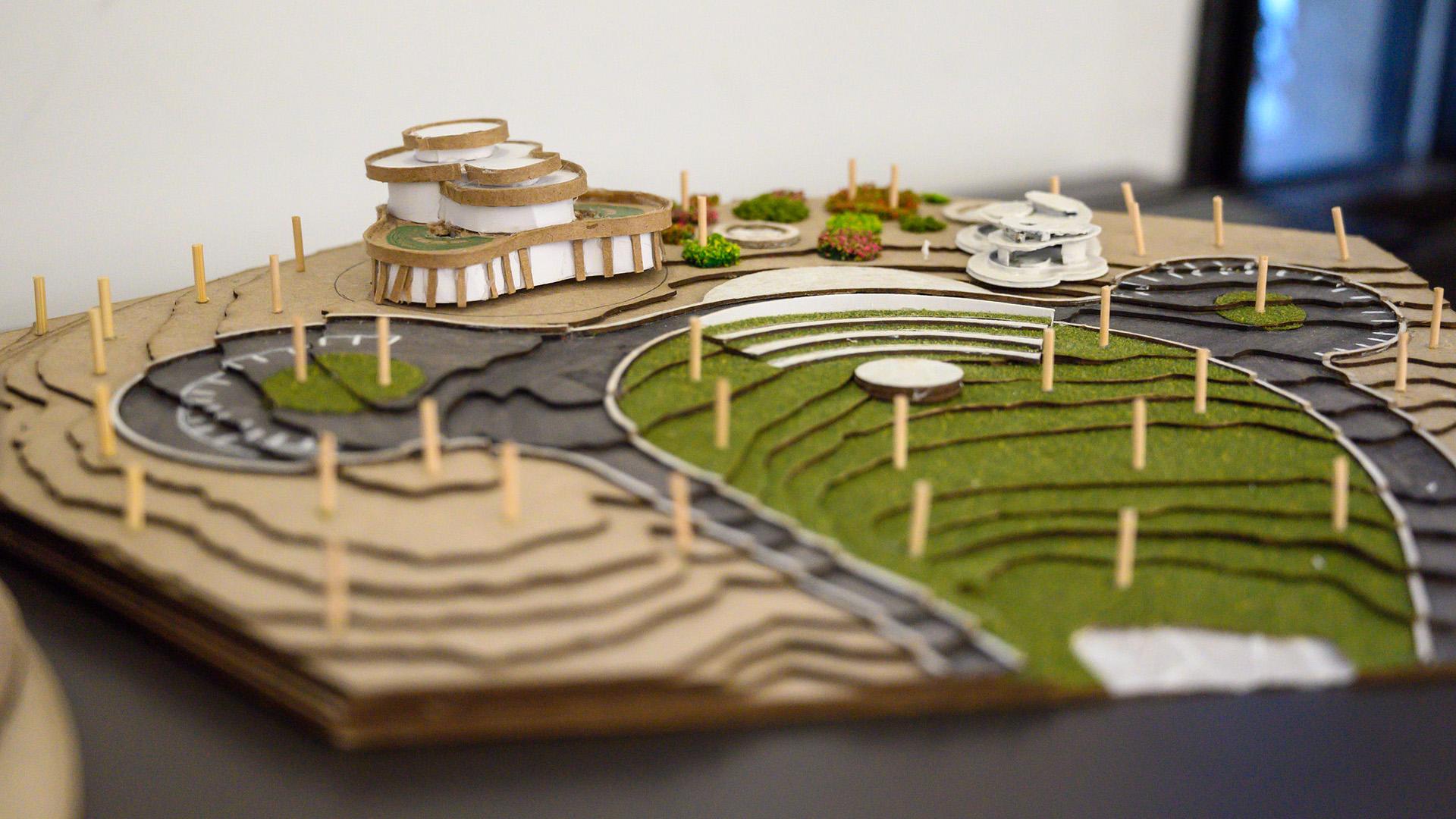 Mini model of a building and scenic green space